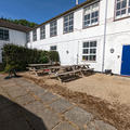 John Krebs Field Station - Outdoor seating - (3 of 8) - Tables on gravel surface