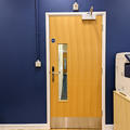 Temporary Staffing Service - Toilets - (1 of 4) - Door into corridor