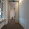 Radcliffe Primary Care - Doors - (7 of 7) - Door held open in corridor